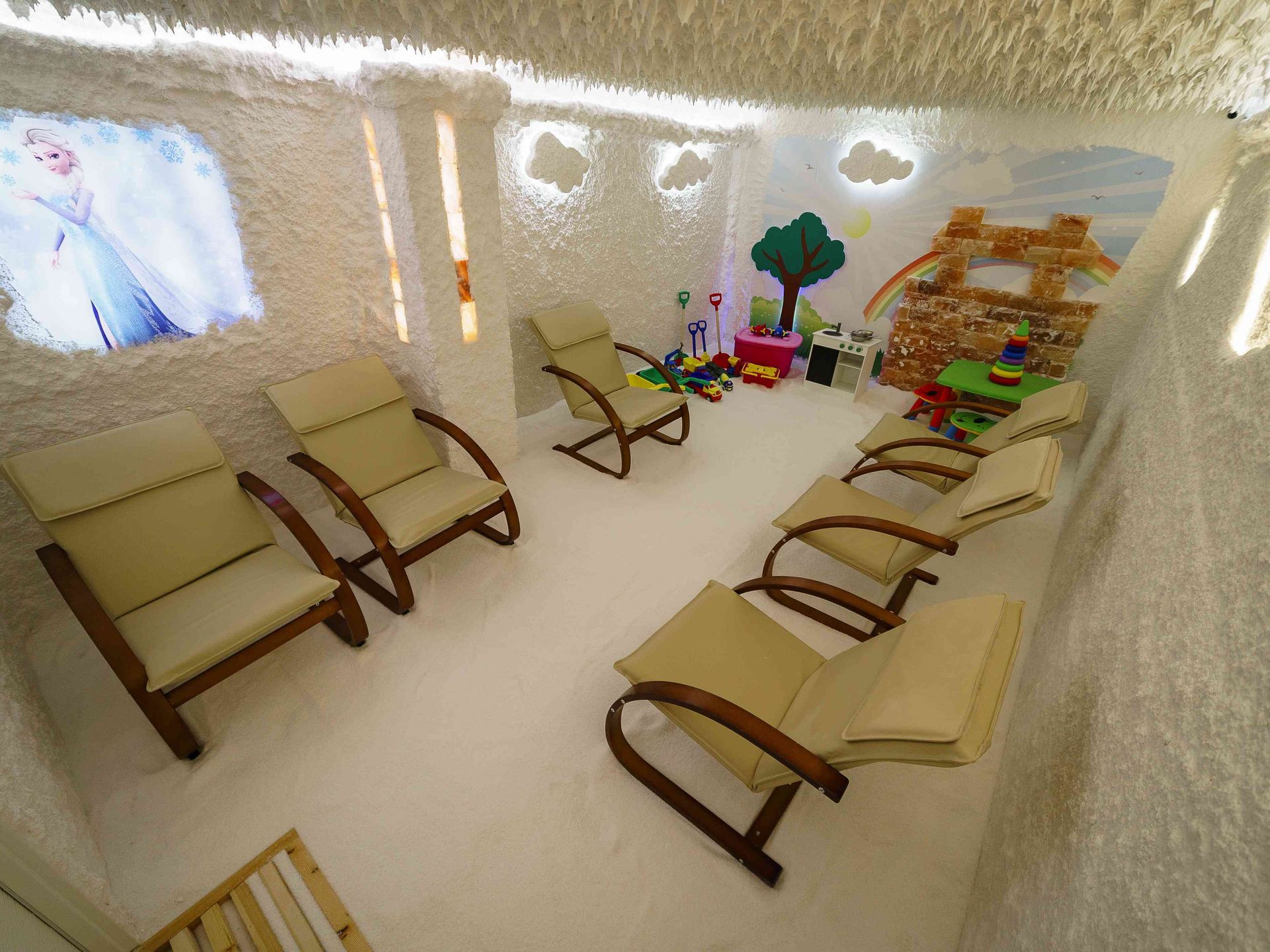 Salt room for a children’s and family centre with loungers and a play area