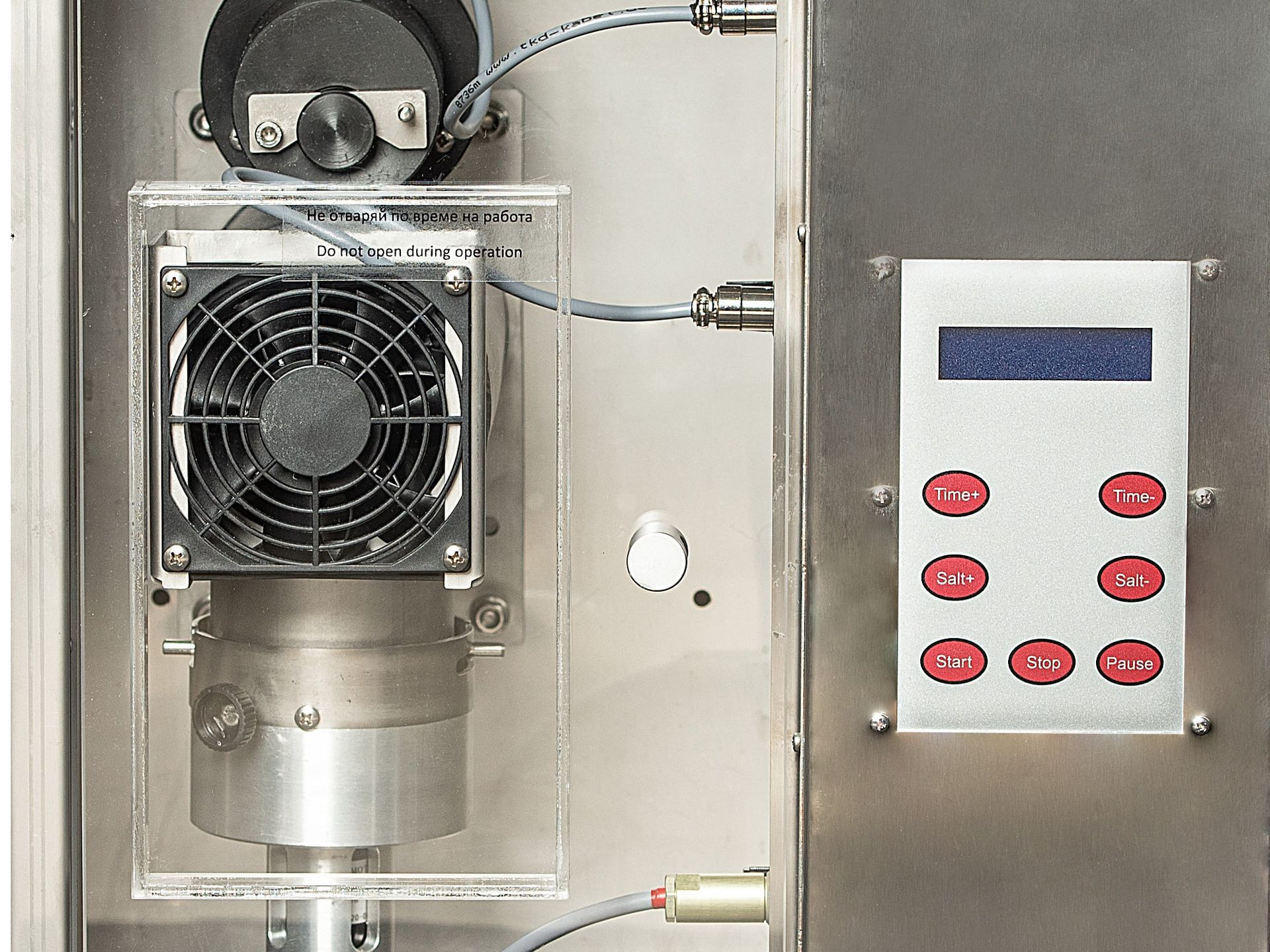 The halogenerator’s inner components — funnel, mill and fan